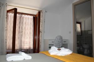 A bed or beds in a room at Oltre la Costa