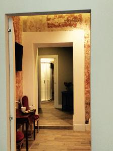 Televízia a/alebo spoločenská miestnosť v ubytovaní B&B NAPOLI AMORE MIO