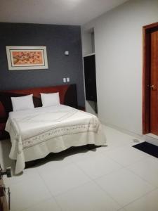Cama o camas de una habitación en Hotel Vicente de la Vega