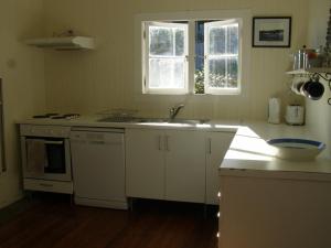A kitchen or kitchenette at The Tree House, 6 Gowing Street