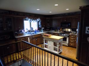 Kjøkken eller kjøkkenkrok på StoneWall House Lakeside Suite