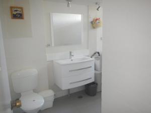 A bathroom at Portsea 16 14 Surf Street