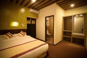 Letto o letti in una camera di Hotel Heranya
