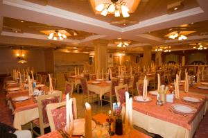 Un restaurant sau alt loc unde se poate mânca la Dolomiti Hotel Olimpia