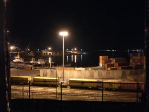 a train yard at night with a street light at A&G Affittacamere in La Spezia
