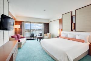 Postel nebo postele na pokoji v ubytování Hotel Nikko Guam