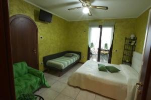 Postel nebo postele na pokoji v ubytování B&B Villa Anita