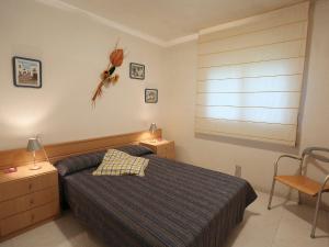 מיטה או מיטות בחדר ב-Apartment Gladiols by Interhome