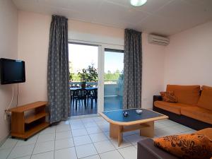 Ruang duduk di Apartment Royal Delta-4 by Interhome