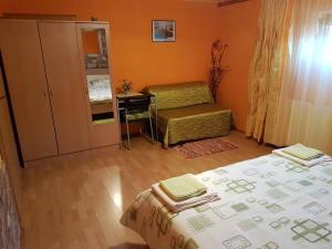 Postel nebo postele na pokoji v ubytování Apartment Tomašević