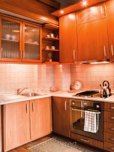 A kitchen or kitchenette at The Heart of the city