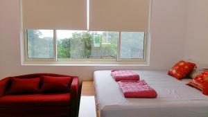 Katil atau katil-katil dalam bilik di Fei Ying Homestay
