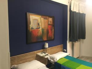 Postel nebo postele na pokoji v ubytování Almi Rooms