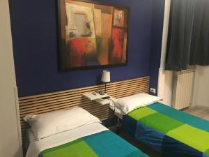 Postel nebo postele na pokoji v ubytování Almi Rooms