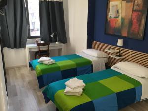 Postel nebo postele na pokoji v ubytování Almi Rooms