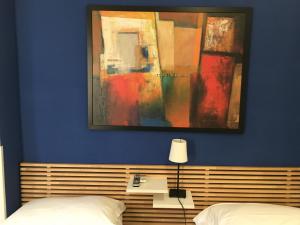 Postel nebo postele na pokoji v ubytování Almi Rooms