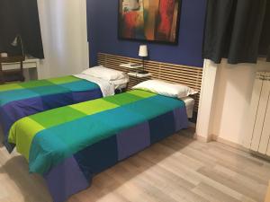 Postel nebo postele na pokoji v ubytování Almi Rooms