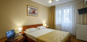 Кровать или кровати в номере Vele Rosse Hotel, business & leisure