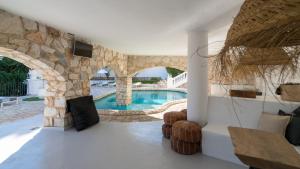 a villa with a swimming pool in a resort at Mijas Residence in Mijas