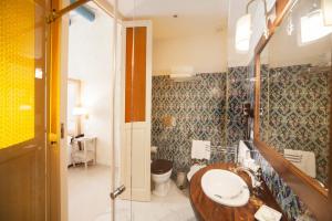 Ένα μπάνιο στο Algilà Ortigia Charme Hotel