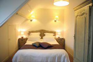 Postel nebo postele na pokoji v ubytování Cit'Hotel La Villa Julia