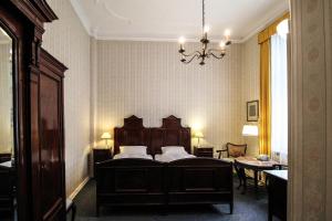 Postel nebo postele na pokoji v ubytování Hotel-Pension Funk am Kurfürstendamm