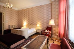 Postel nebo postele na pokoji v ubytování Hotel-Pension Funk am Kurfürstendamm