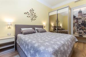 Postel nebo postele na pokoji v ubytování Casa Veneziana