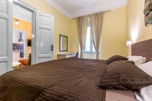 Postel nebo postele na pokoji v ubytování Casa Veneziana