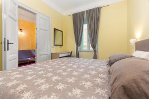 Postel nebo postele na pokoji v ubytování Casa Veneziana