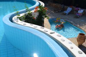 Bazén v ubytovaní Country Hotel Velani alebo v jeho blízkosti
