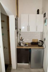 Kuchnia lub aneks kuchenny w obiekcie Apartament Żelazna