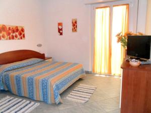 Cama o camas de una habitación en Residence Carioca
