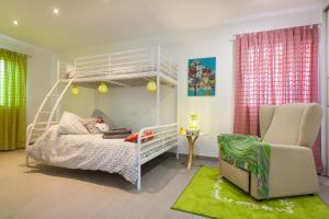 A bed or beds in a room at Llevant