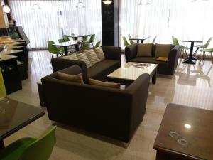 Posezení v ubytování Maple Hotel