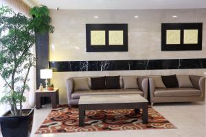 Posezení v ubytování Maple Hotel