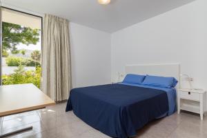A bed or beds in a room at Mollet