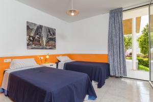 A bed or beds in a room at Mollet