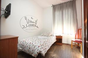 Posteľ alebo postele v izbe v ubytovaní Hostal Restaurante Central