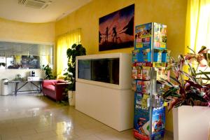 TV a/nebo společenská místnost v ubytování Residence Beach Paradise
