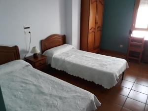 Katil atau katil-katil dalam bilik di Hostal Ardoi +53 gambar