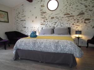 En eller flere senge i et værelse på La Maison dans la Brie