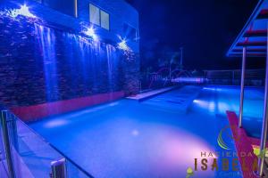 Bazén v ubytování Hacienda Isabela Hotel Campestre nebo v jeho okolí