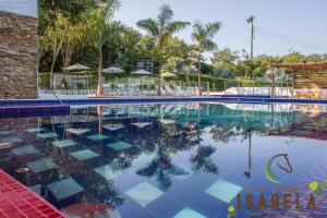 Bazén v ubytování Hacienda Isabela Hotel Campestre nebo v jeho okolí