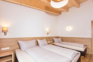 Posteľ alebo postele v izbe v ubytovaní Apart Ida