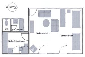 a floor plan of a house with diagrams at Ferienwohnung Saskia in Deiningen +1 photo