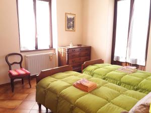 Postel nebo postele na pokoji v ubytování Como Country House