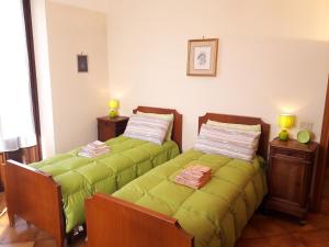 Postel nebo postele na pokoji v ubytování Como Country House