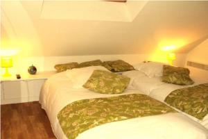 Postel nebo postele na pokoji v ubytování Auberge An Douar