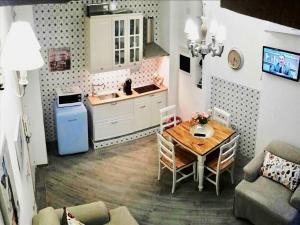 Η κουζίνα ή μικρή κουζίνα στο Casa Ornella Napoli +14 φωτογραφίες